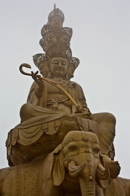 Big golden Buddha waiting on the summit