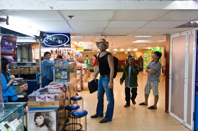 Florian in a mall  in Saigon. The rooms are barely high enough.